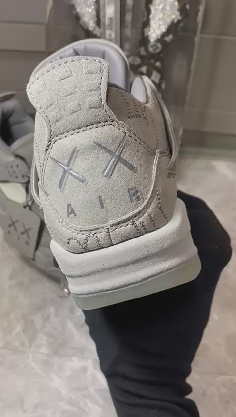 Kaws x air jordan 4 retro cool grey 